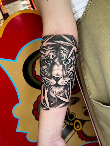 Explore wrist tattoo name ideas, creative tattoo ideas in Honolulu, available at Sacred Art Tattoo Waikiki