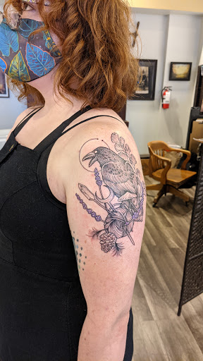 Explore sunlight tattoo ideas, creative tattoo ideas in Portland, available at Dire Wolf Tattoo Studio