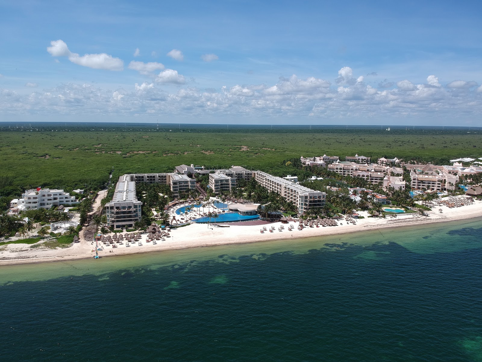 Foto de Excellence Riviera Cancun com areia bege fina superfície
