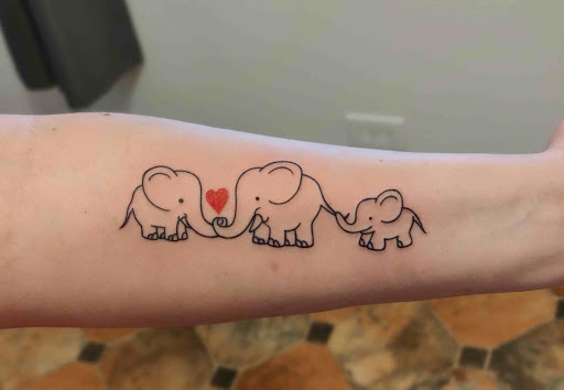 Explore curly hair tattoo ideas, creative tattoo ideas in Hebron, available at Explosive Ink Tattoo