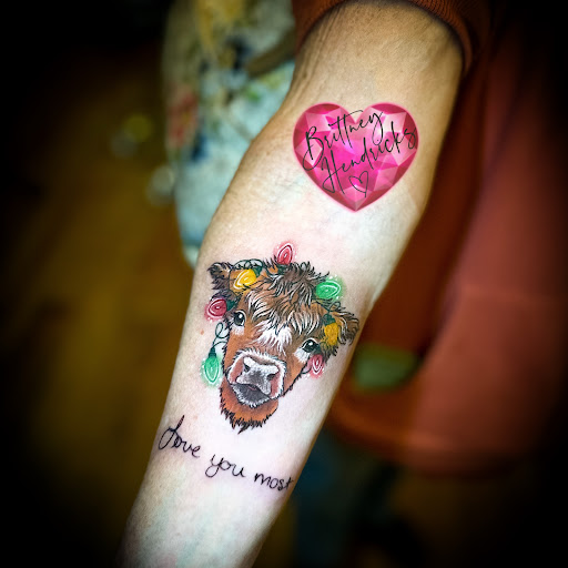 Explore female arm tattoo ideas, creative tattoo ideas in Sevierville, available at Jaded Art Collective