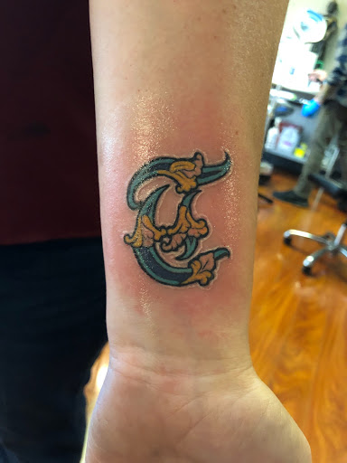 Find lettering tattoo ideas for your next unique tattoo in Dover at Enlightened Ink Tattoos