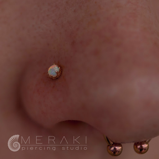 Explore religious tattoo idea, creative tattoo ideas in Stow, available at Meraki piercing studio