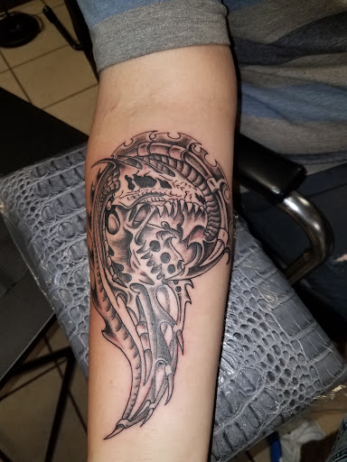 Explore couple finger tattoo ideas, creative tattoo ideas in Bowling Green, available at The Mad Tatter, L.L.C.