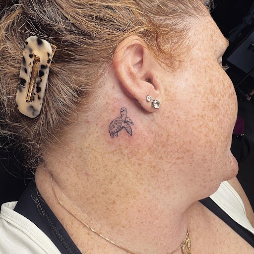 Explore cute cow tattoo ideas, creative tattoo ideas in Arlington, available at Rock and Rose Tattoo