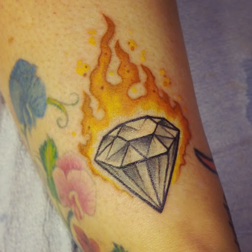 Explore anime symbol tattoo ideas, creative tattoo ideas in Cleveland, available at Stranci Tattoo & Piercing Co.