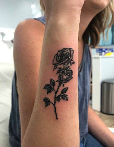 Explore backpiece tattoo ideas, creative tattoo ideas in Buford, available at Wild Tribe Tattoos and Piercings