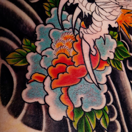 Explore bone tattoo ideas, creative tattoo ideas in Arlington, available at Benchmark Tattoos