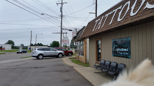 Explore compass tattoo ideas for men, creative tattoo ideas in Owosso, available at Expressions Body Art Studio