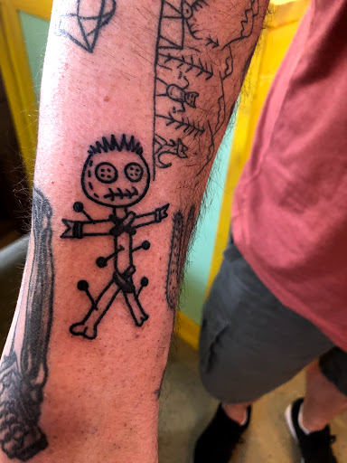 Explore daisy flower tattoo ideas, creative tattoo ideas in New Orleans, available at Treasure Tattoo