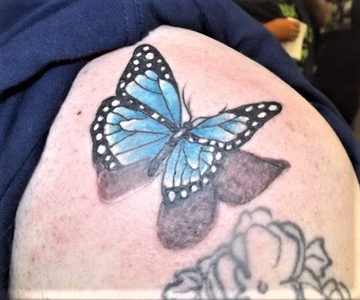 Explore hood tattoo ideas, creative tattoo ideas in Muscatine, available at Stigma Tattoo & Body Piercing