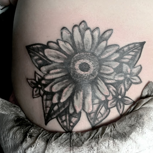 Explore lower arm half sleeve tattoo ideas, creative tattoo ideas in Erie, available at EliKingInk