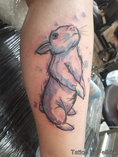 Explore snake tattoo ideas for men, creative tattoo ideas in Fort Myers, available at Tiger Lotus Tattoo and Piercing