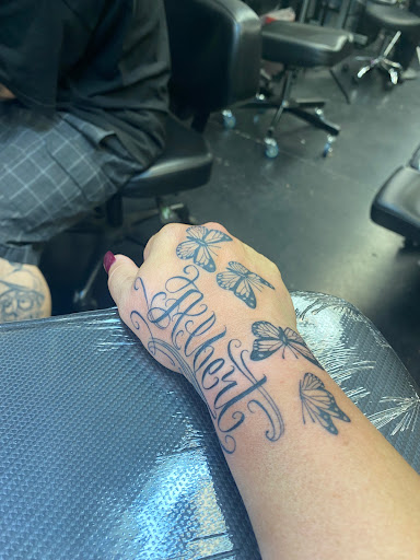 Find family matching tattoo ideas for your next unique tattoo in Orange at Ink Activitiez Tattoo