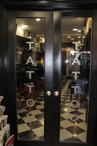 Explore family tree tattoo ideas for females, creative tattoo ideas in Boston, available at Boston Barber & Tattoo Co.