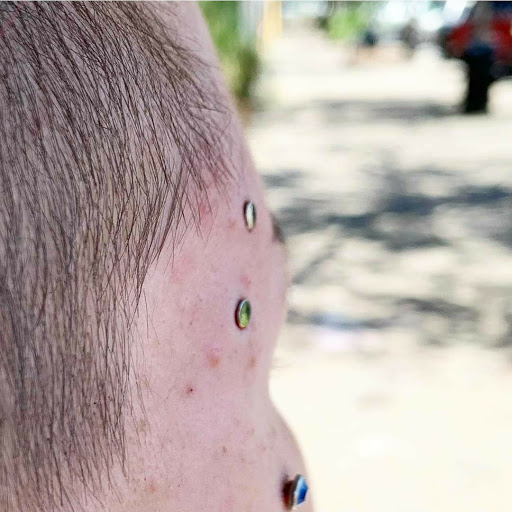 Explore mens arm tattoo ideas small, creative tattoo ideas in Summerville, available at Exotic Impressions Body Piercing