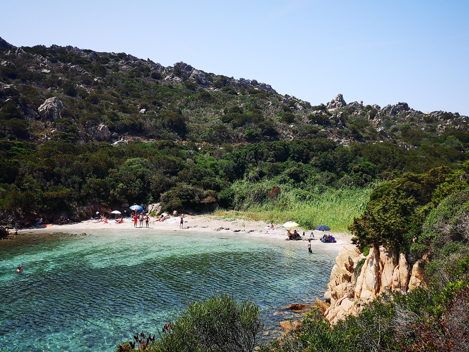 Photo of Cala Lunga beach with bright sand surface