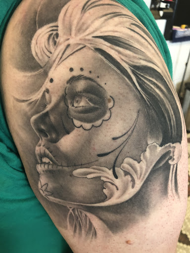Explore tattoo cover up ideas for shoulder, creative tattoo ideas in Junction City, available at New Era Tattoo Studio