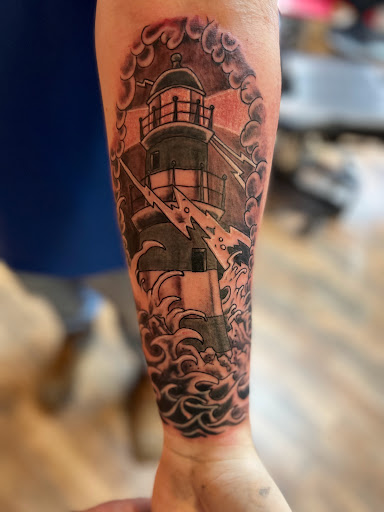 Explore mechanical sleeve tattoo ideas, creative tattoo ideas in Pikeville, available at The Carbon Canary Tattoo Studio