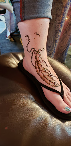 Explore cross sleeve tattoo ideas, creative tattoo ideas in Seaside, available at Five Star Henna