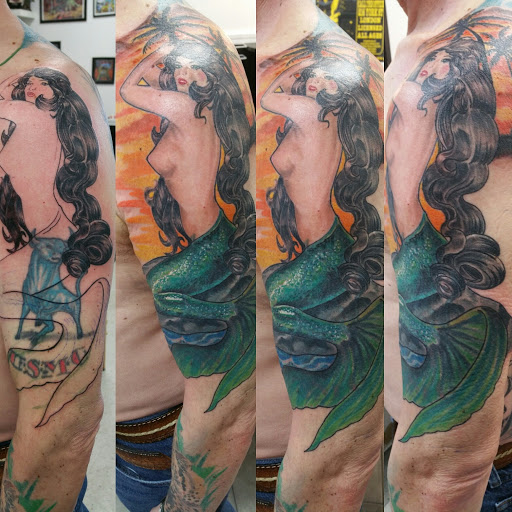 Explore half leg sleeve tattoo ideas for men, creative tattoo ideas in Redford, available at Empire Tattoo Studio