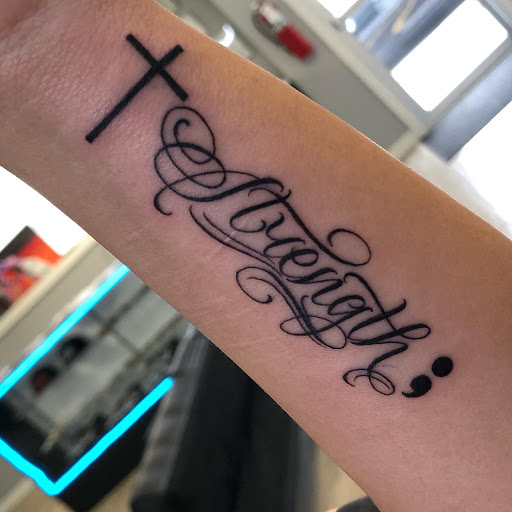 Explore neck tattoo men ideas, creative tattoo ideas in Springdale, available at Tattoo Cartel