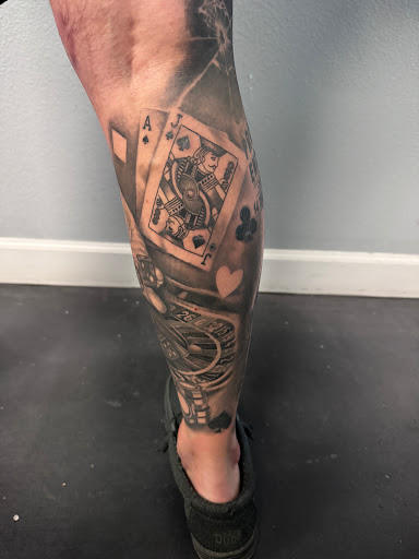 Explore photography tattoo ideas, creative tattoo ideas in Riverview, available at 9-Line Tattoo