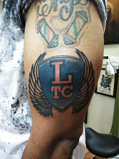 Explore name tattoo ideas on neck, creative tattoo ideas in Havertown, available at Havertown Electric Tattoo