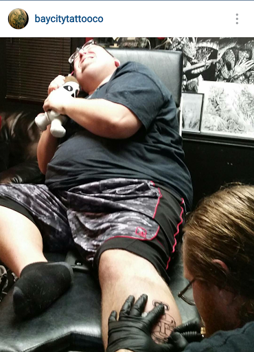 Explore hip hop tattoo ideas, creative tattoo ideas in Erie, available at EliKingInk