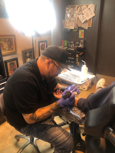 Find black mamba kobe bryant tattoo ideas for your next unique tattoo in Fort Wayne at Grade A Tattoos and Body Piercing