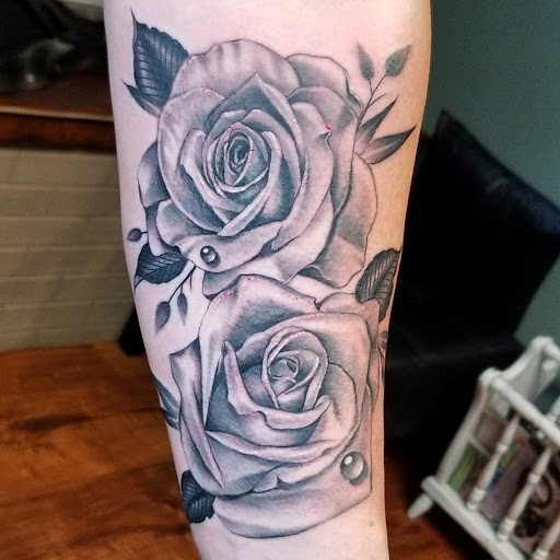 Explore tattoo filler ideas for guys, creative tattoo ideas in Omaha, available at Black Squirrel Omaha