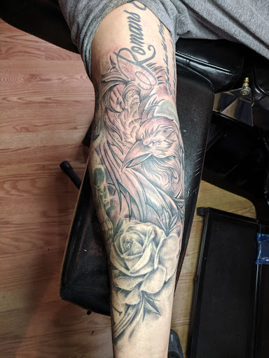Explore dark sleeve tattoo ideas, creative tattoo ideas in Butler, available at The Ink Vault