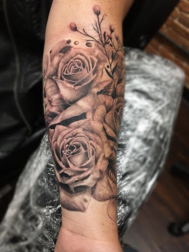 Explore word tattoo ideas for men, creative tattoo ideas in Dubuque, available at The Crows Nest