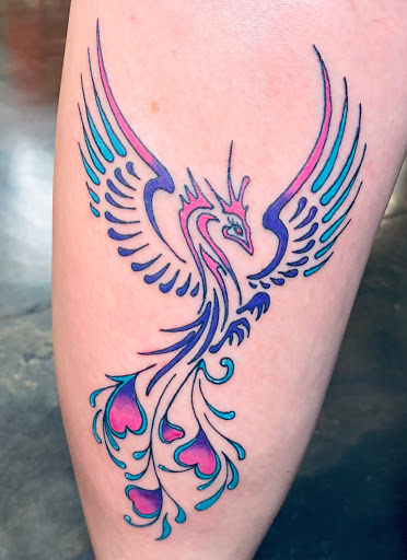 Explore fishing hook tattoo ideas, creative tattoo ideas in Colorado Springs, available at Fallen Heroes Tattoo & Piercing (Colorado)