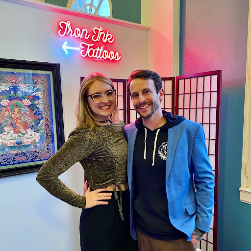 Explore blackout hand tattoo ideas, creative tattoo ideas in Ironwood, available at Iron Ink Tattoos