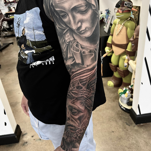 Explore 2 dog tattoo ideas, creative tattoo ideas in Maryland Heights, available at Thirteen Roses Tattoo & Aesthetics
