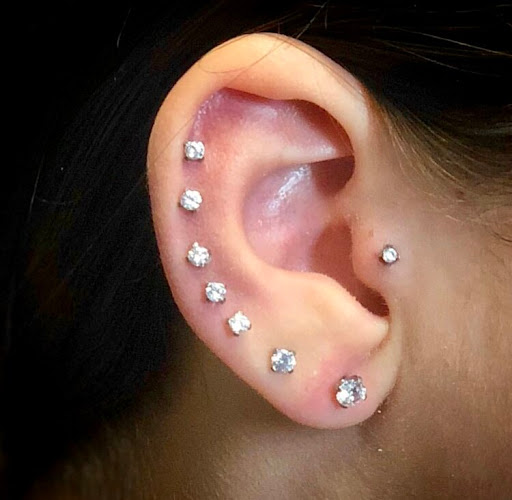 Explore ideas for matching couple tattoos, creative tattoo ideas in Bay Shore, available at Piercings By Dean 95