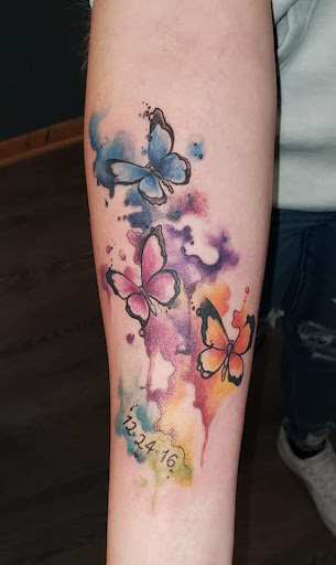 Explore fist tattoo ideas, creative tattoo ideas in Johnson City, available at Defiant Designs