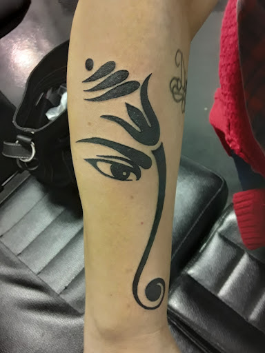 Explore laos tattoo ideas, creative tattoo ideas in Madison, available at ART IMMORTAL TATTOO