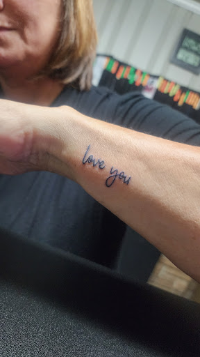 Explore tattoo ideas for names, creative tattoo ideas in Phenix City, available at Skin Traditions Tattoo Studio