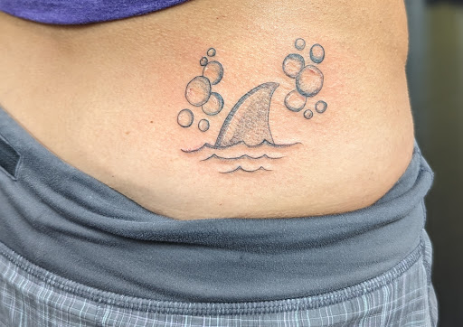 Explore cute thigh tattoo ideas, creative tattoo ideas in San Diego, available at Goddess Temple Tattoo Studio