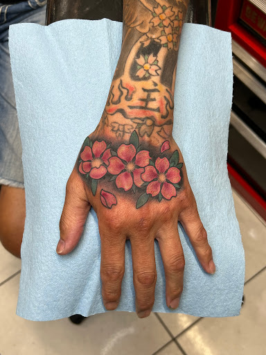 Explore dad tattoo ideas for daughter, creative tattoo ideas in Honolulu, available at Sacred Art Tattoo Waikiki
