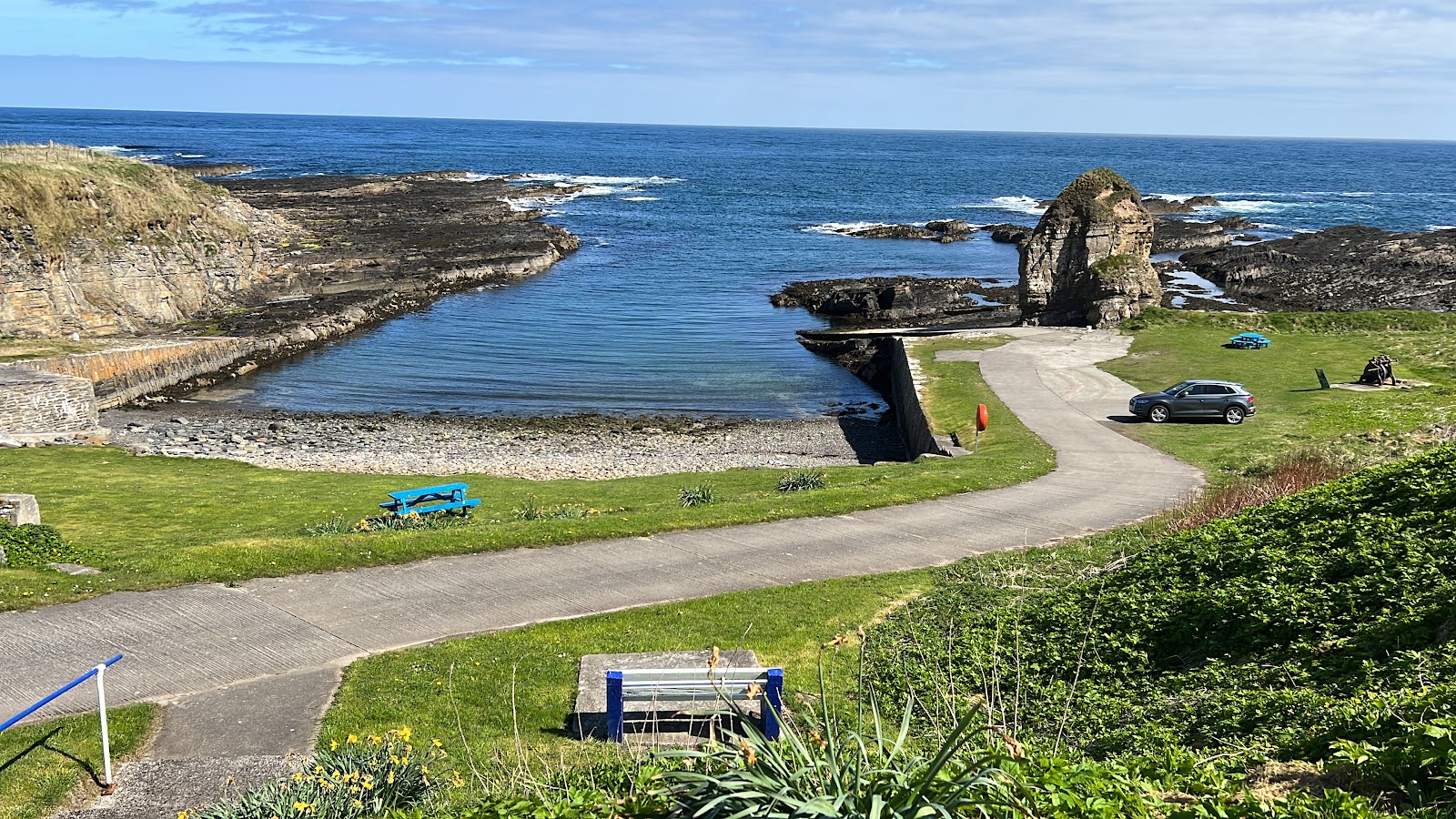 Foto av Staxigoe Hall Beach med grå sten yta