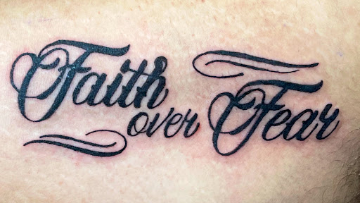 Explore front of neck tattoo ideas, creative tattoo ideas in Shermans Dale, available at Unhinged Ink