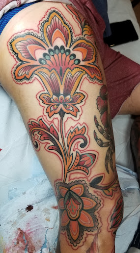 Explore big flower tattoo ideas, creative tattoo ideas in Huntington Beach, available at Mechanical Concept Tattoo