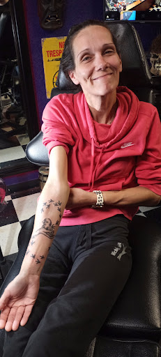 Explore sunshine tattoos ideas, creative tattoo ideas in Prudenville, available at Dark Horse Tattoo Studio