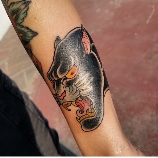 Explore mom tattoo ideas for men, creative tattoo ideas in San Antonio, available at Dandyland Custom Tattoo and Professional Body Piercing