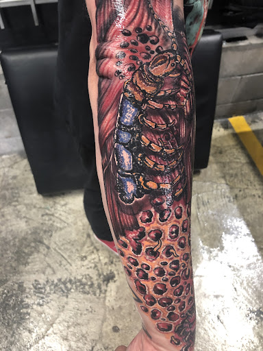 Explore ring finger tattoo ideas, creative tattoo ideas in Conroe, available at Nicoles Tattoos and Piercings