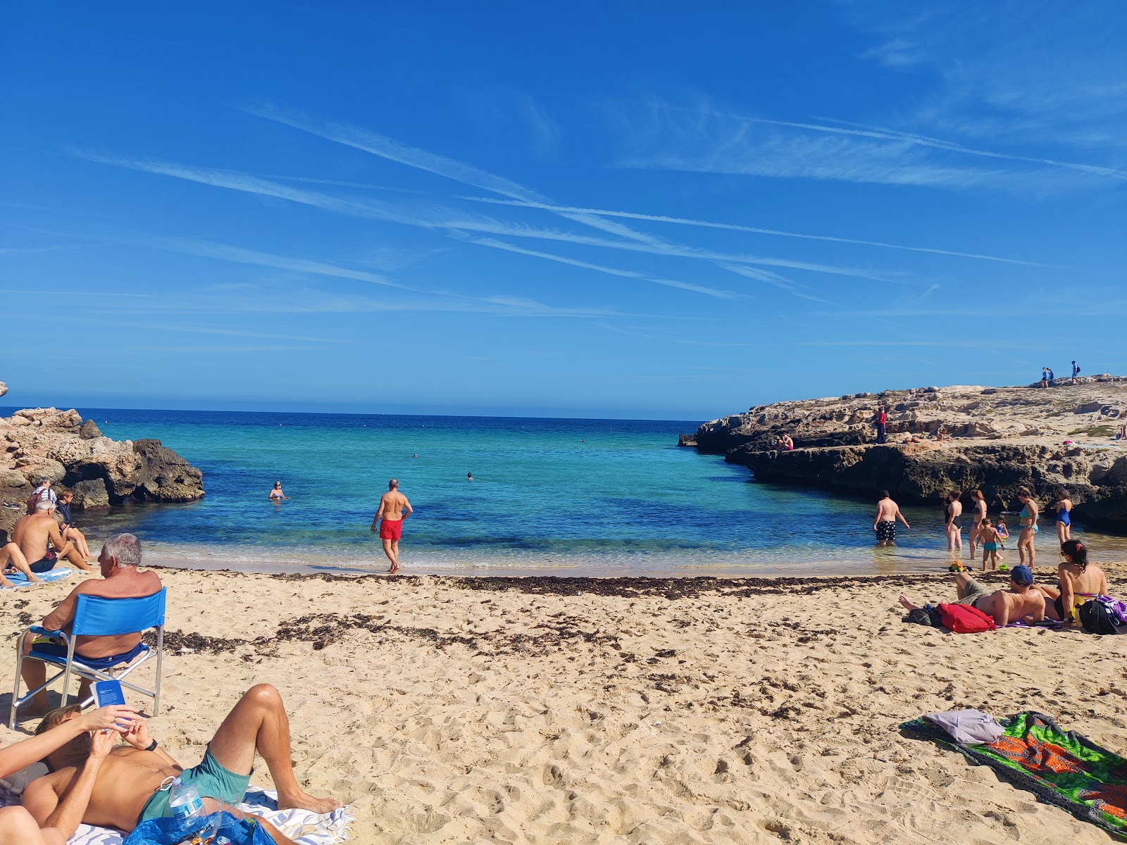 Photo de Cala Porto Rosso Beach et le règlement