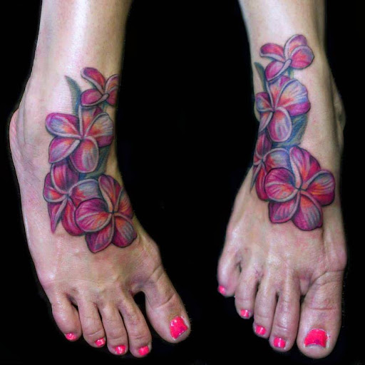 Explore sleeve tattoo ideas for ladies, creative tattoo ideas in Stuart, available at Tiger Shark Tattoo Studio